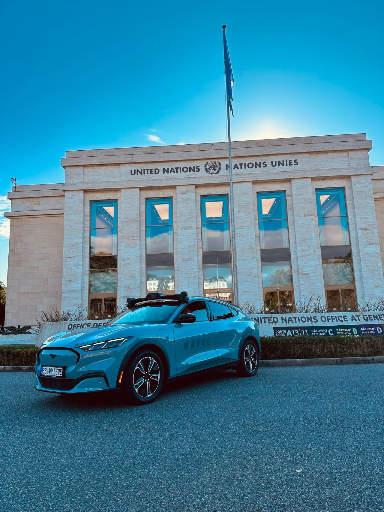 Wayve roadshow vehicle outside the United Nations Office at Geneva